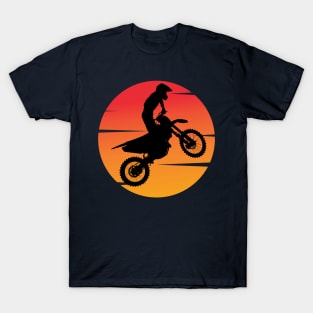 motocross silhouette jumping in front of the afternoon sun T-Shirt